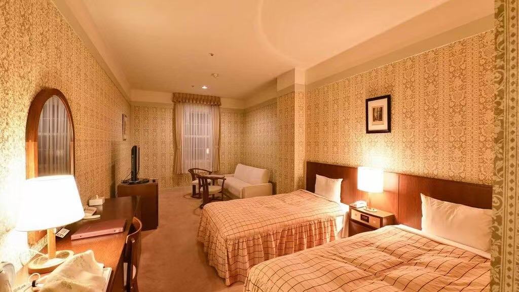 Twin guest room at Yugashima Hotel Resort